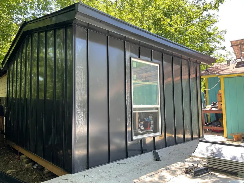 Black standing seam metal wall panels for Roof Inspection in Quartz Hill