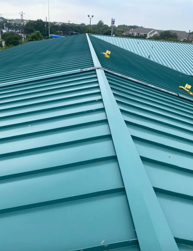 Green commercial metal roof ridge and valley for Metal Roof Repair in Quartz Hill